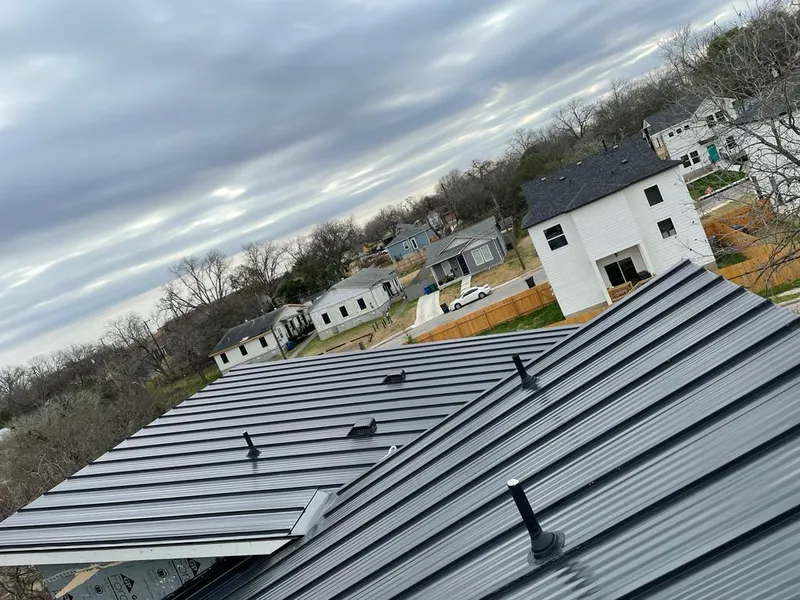 Standing seam metal roof panels with vents for Skylight Repair in Caledonia
